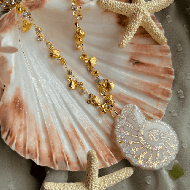 Gold and White Nautilus Shell Statement Necklace with Shell and Cubic Zirconia Chain